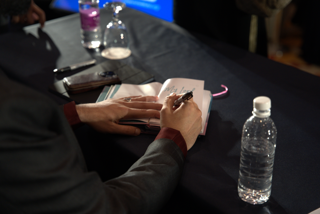 Signing book "My Lord is with Me"